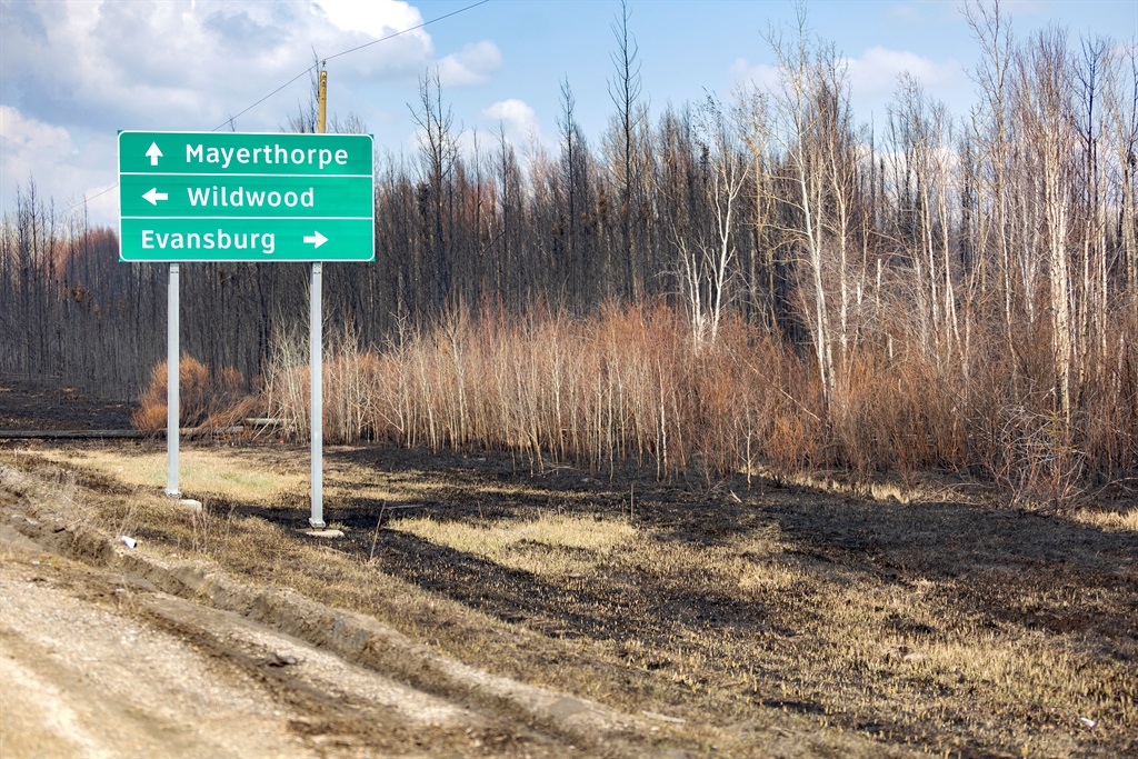 A sign just off Highway 16 is pictured surrounded 