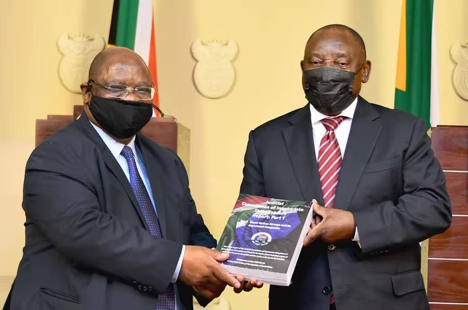 President Cyril Ramaphosa receives the first part of the state capture report from acting Chief Justice Raymond Zondo at the Union Buildings in Pretoria. Photo: GCIS