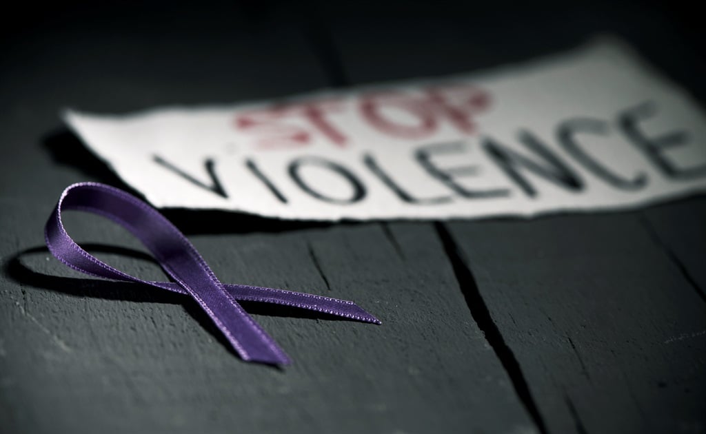 a purple ribbon for the GBV awareness .