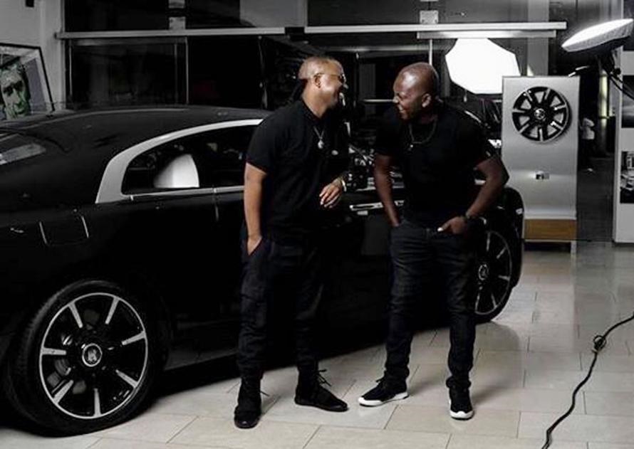 Cassper Nyovest (inset) and DJ 
Euphonik at a dealer with some show-off wheels.