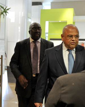 Finance Minister Pravin Gordhan and his deputy Nhlanhla Nene on their way to deliver the mini budget.