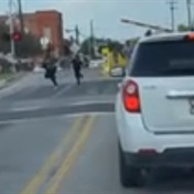 WATCH | Group narrowly escapes just before train hits their car