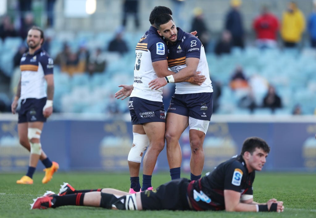 Tom Wright and Len Ikitau of the Brumbies celebrate victory during the round 13 Super Rugby Pacific match between ACT Brumbies and Crusaders at GIO Stadium, on 18 May 2024, in Canberra, Australia. (Mark Metcalfe/Getty Images)