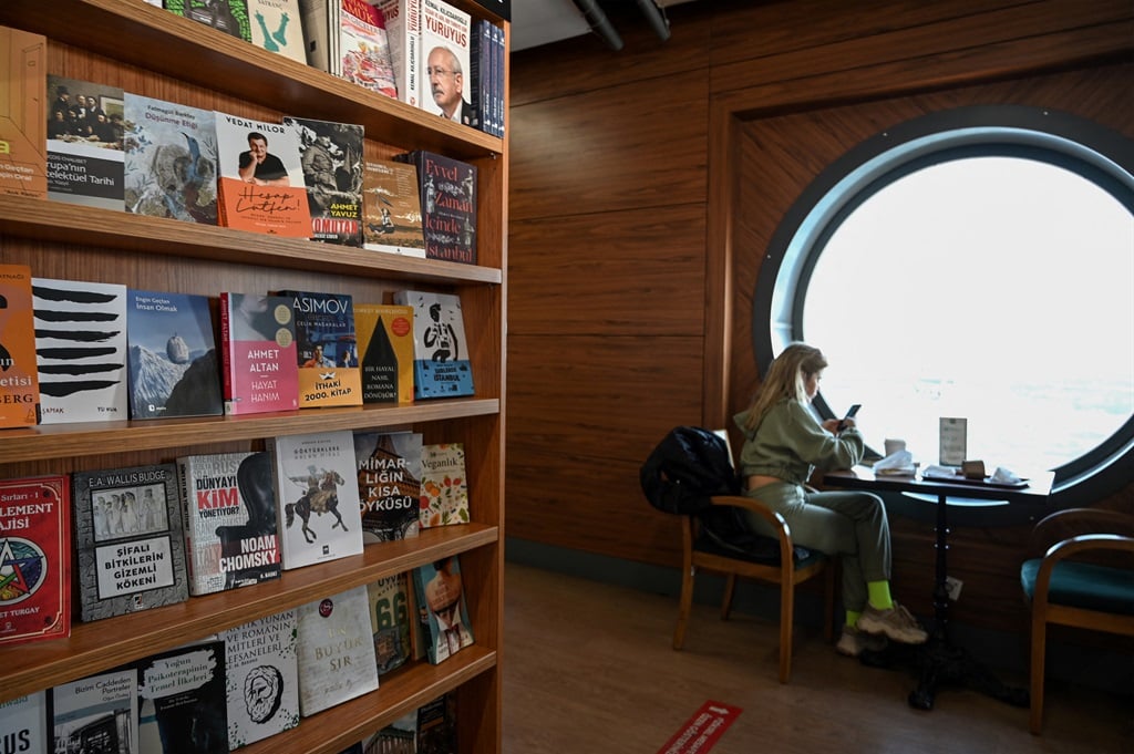 Books are displayed inside a bookstore at Karakoy port in Istanbul on December 2, 2021. The Turkish book industry -- almost entirely dependant on paper imports -- pinpoints one of the flaws in the economic experiment Erdogan has unleashed on his nation of 84 million people in the past few months. (Ozan Kose / AFP)
