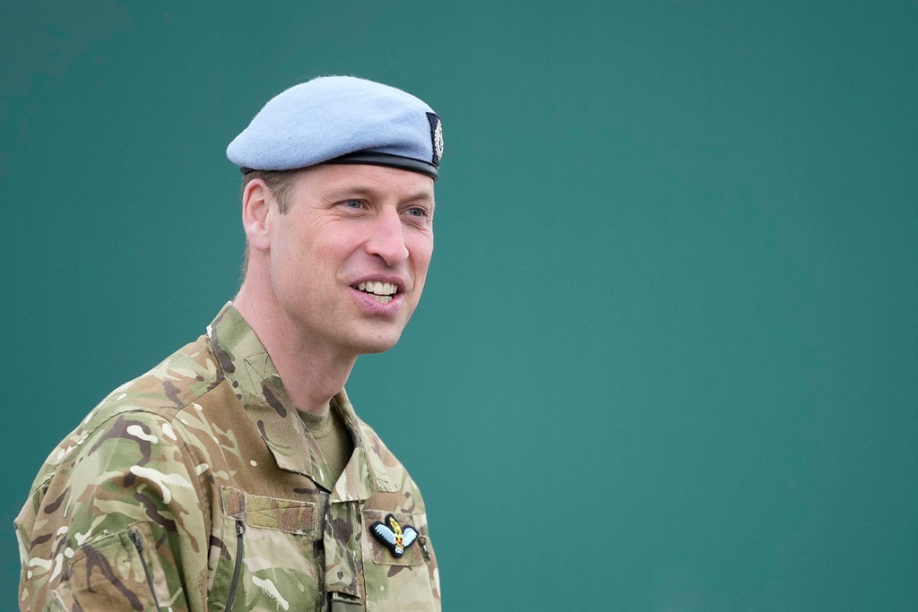 Britain's Prince William, Prince of Wales speaks t