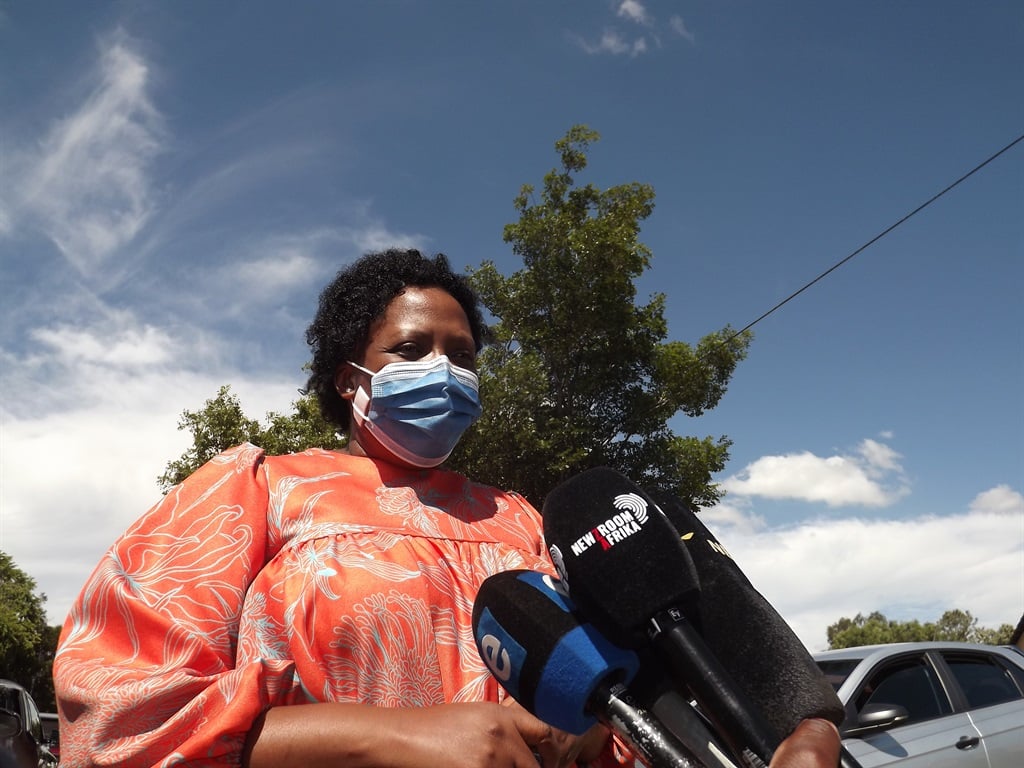 Mpumalanga Premier Refilwe Mtshweni-Tsipane addressing reporters outside the home of deceased Emalahleni Local Municipality mayor, Linah Malatjie.