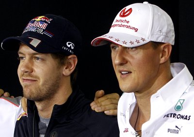 <b>PASSING THE TORCH:</b> Sebastian Vettel, competing for his third Drivers' title in Brazil, hailed Michael Schumacher as his childhood hero.
