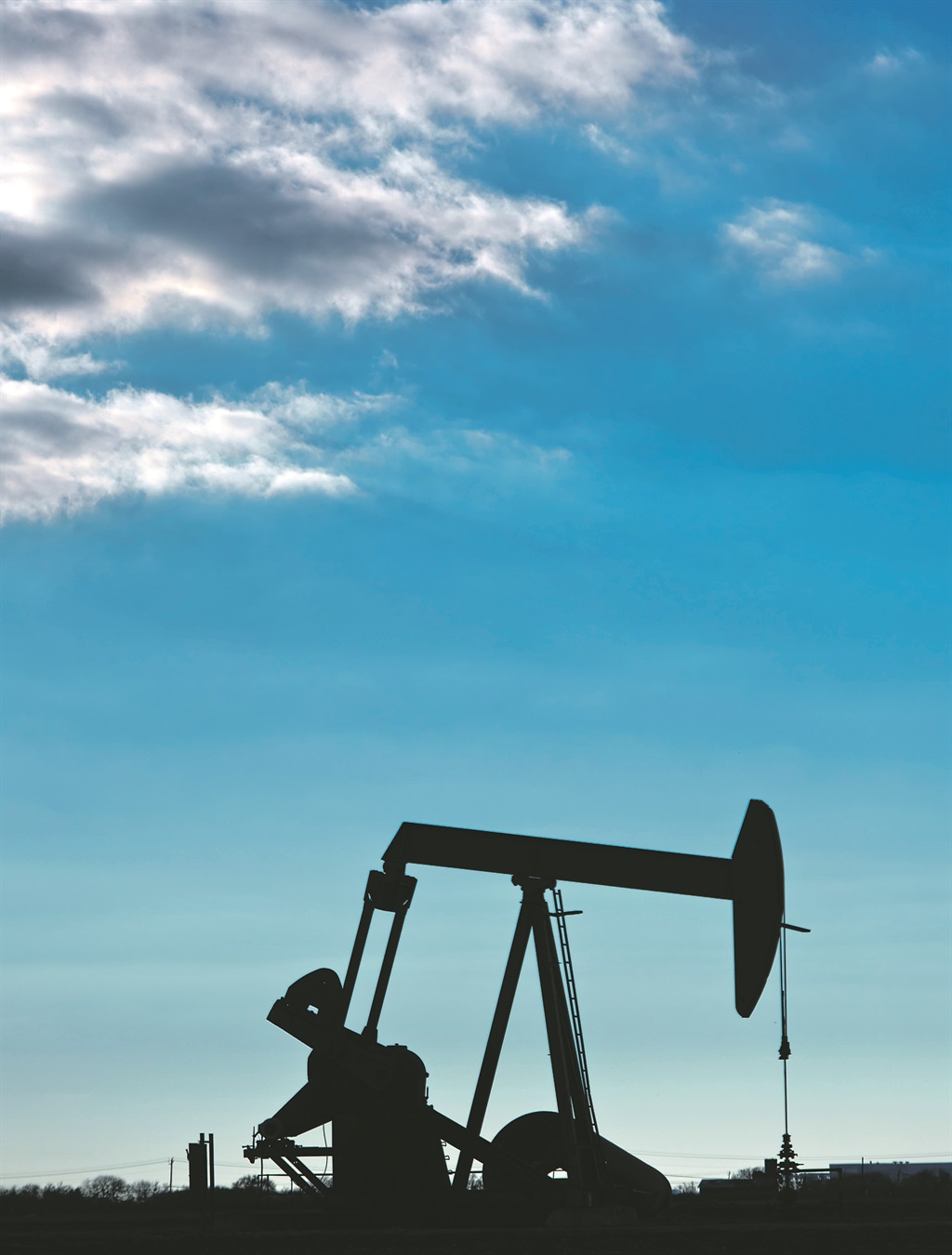 A pump jack operates in an oilfield near Corpus Christi, Texas, in the US. Crude oil prices slid to their lowest levels since December 2003 this week as turbulence in China, the world’s biggest energy consumer, prompted renewed concerns about the strength of demand. Picture: Eddie Seal/Bloomberg