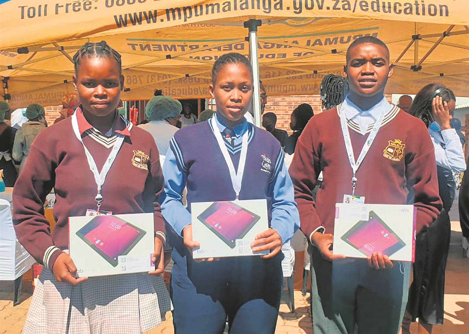 Mpumalanga grade 12 pupils Samkelo Tshabalala, Minenhle Nhlabathi and Kwanele Dladla are happy to be introduced to the e-learning programme.    Photo by Bulelwa Ginindza