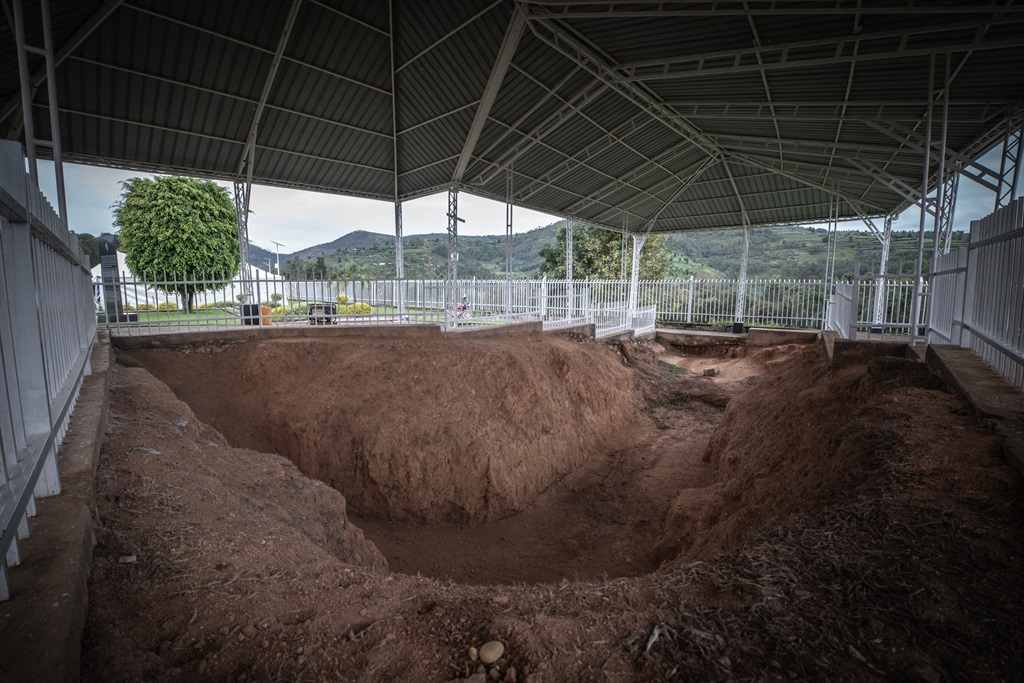 A former mass grave remains open at the Murambi genocide memorial in Nyamagabe, southern Rwanda, on 21 April, 2022. 
