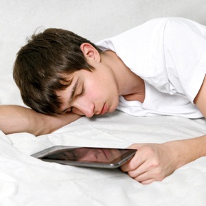 Tired young man from Shutterstock