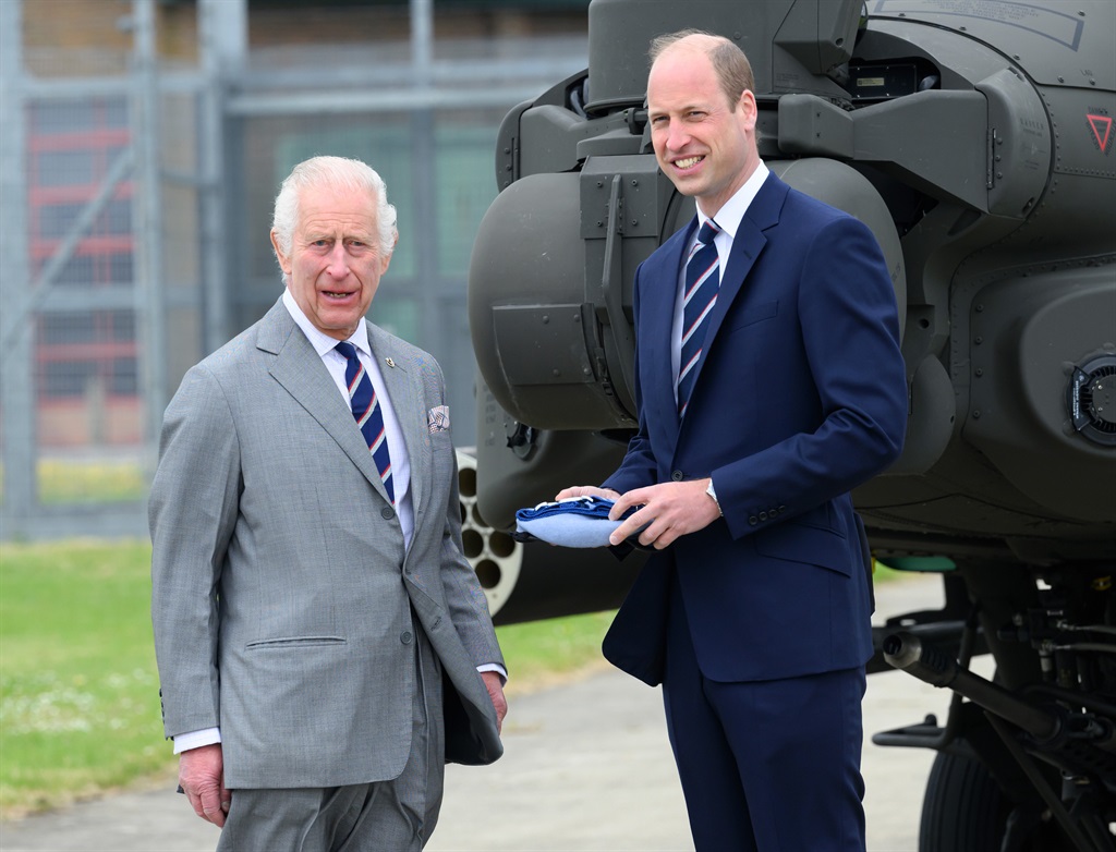 King Charles III and Prince William, Prince of Wales, during the official handover in which King Charles III passes the role of Colonel-in-Chief of the Army Air Corps to Prince William, Prince of Wales, at the Army Aviation Centre on 13 May 2024 in Stockbridge, Hampshire. (Karwai Tang/WireImage)
