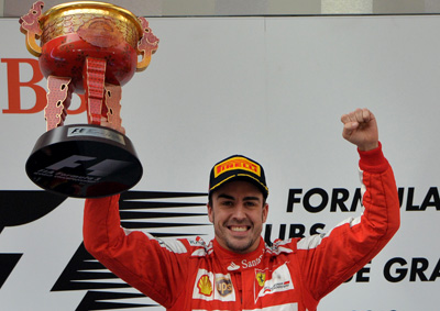 <b>SUPER HAPPY:</B> Ferarri's Fernando Alonso could not hide his excitement on the podium after grabbing the 2013 China GP title onSunday, April 14.