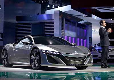 <b>BEAUTIFUL MOMENT:</b> Takanobu Ito, president and CEO of Honda Motor Corporation, launches the Acura NSX concept car at the North American International Auto Show in Detroit, Michigan, on January 9, 2012. <i>Image: AFP</i>