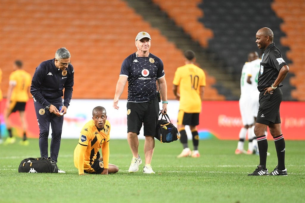 JOHANNESBURG, SOUTH AFRICA - MARCH 05: Wandile Duba of Kaizer Chiefs with Dr Mohammed Moosajee and David Milner while Referee Thando Ndzanzeka during the DStv Premiership match between Kaizer Chiefs and Golden Arrows at FNB Stadium on March 05, 2024 in Johannesburg, South Africa. (Photo by Lefty Shivambu/Gallo Images)