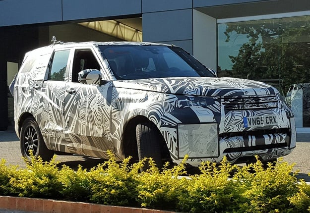<b>DISCO 5 IN SA? </b> Wheels24 reader Johan du Preez spotted a large camouflaged SUV outside a Land Rover dealership in Stellenbosch. Is this the new Discovery 5? <i> Image: Johan du Preez </i>