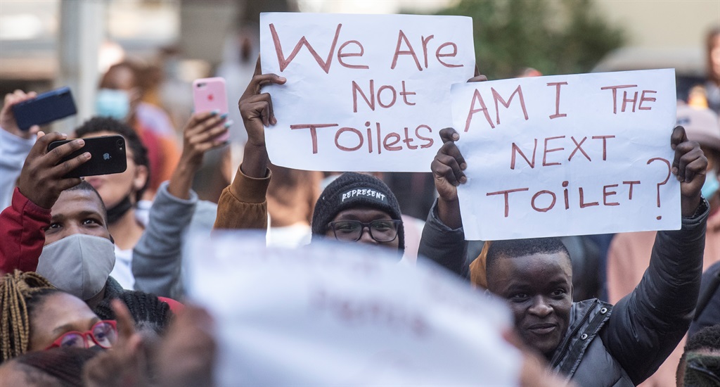 Students protests against racism at Stellenbosch University last month after an alleged racist incident that saw a white student urinating on the personal property of a black student. (Photo by Gallo Images/Brenton Geach)