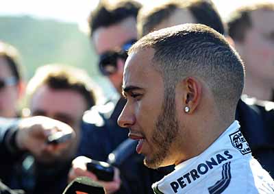 <b>WAS HE 'THROWN OUT'?</b> Now Mercedes F1 driver Lewis Hamilton claimed he was thrown out of his former team McLaren's garage - but that team says not. <i>Image: AFP</i>