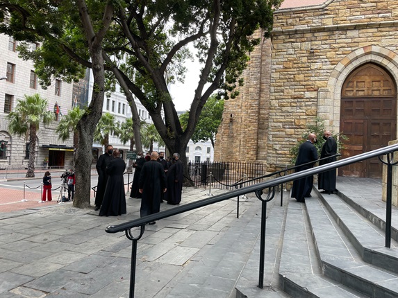 <p>Clergies from the Anglican Church have gathered outside the cathedral. Some of the clergies have been asked to be pallbearers, while others are serving on the committee planning Tutu’s funeral. </p><p>- Marvin Charles</p>