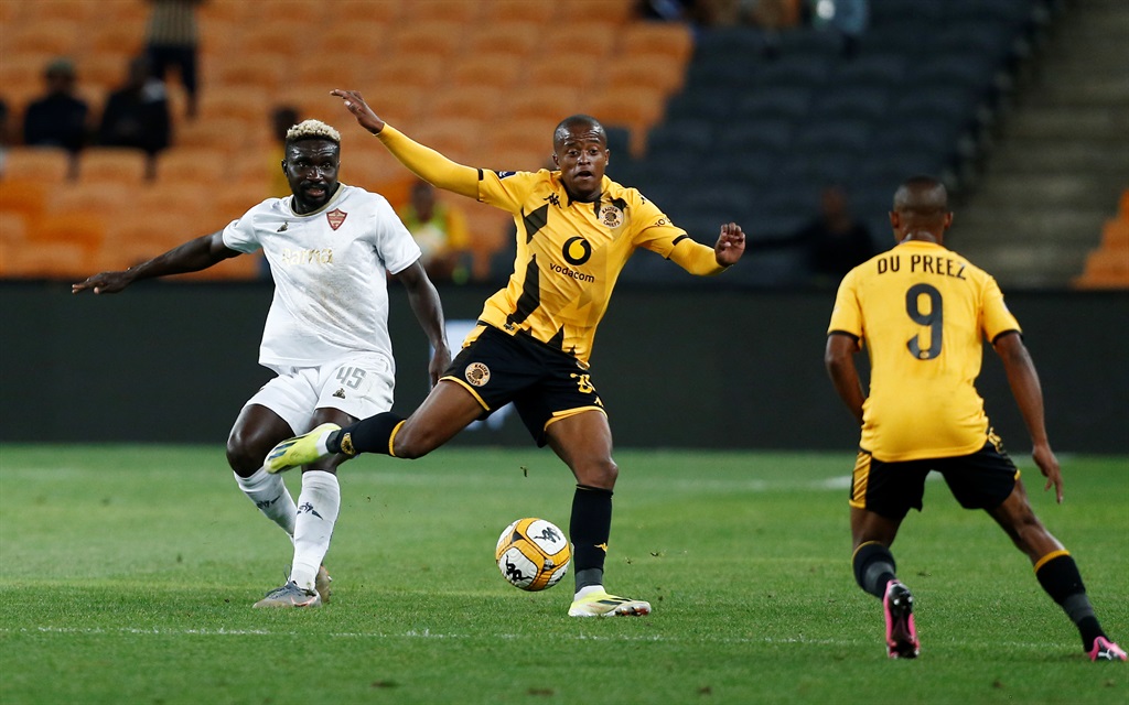 Wandile Duba and Ashley du Preez of Kaizer Chiefs in action with Ismael Toure of Stellenbosch FC during the DStv Premiership match between Kaizer Chiefs and Stellenbosch FC at FNB Stadium on April 02, 2024 in Johannesburg, South Africa. 