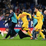 WATCH | Barcelona win La Liga, chased from pitch by angry Espanyol fans