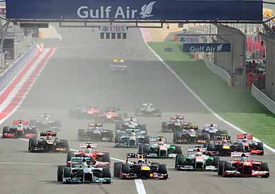 <b>IN A BUNCH:</b> The crowded start of the 2013 Bahrain F1 GP with a hard fight ahead. <i>Image: AFP</i>