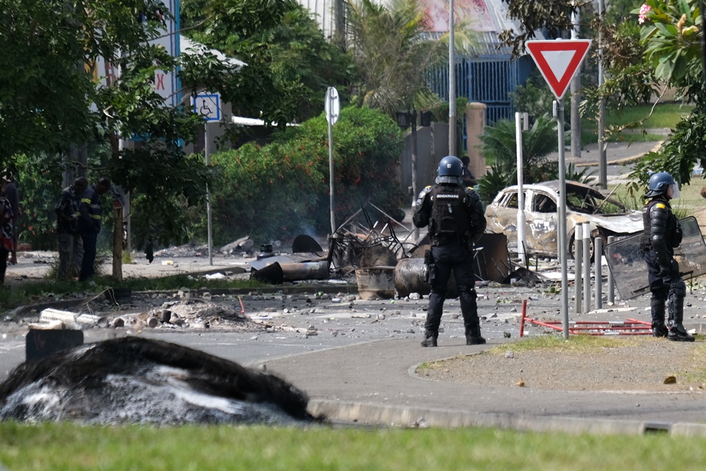 News24 | France’s New Caledonia imposes curfews after protests, firing of high-calibre weapons at security