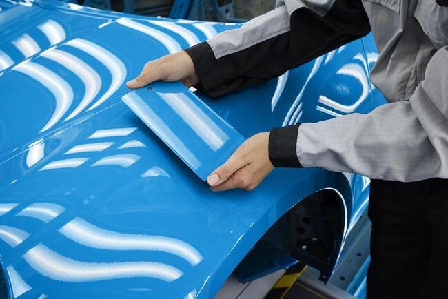 Porsche 911 receiving custom paint work