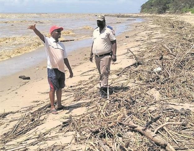 The shores of Tugela Mouth have been covered in debris due to flooding of the river mouth.