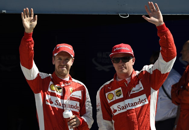 Former Ferrari team mates Kimi Raikkonen and Sebastian Vettel. Image: AFP / Olivier Morin
