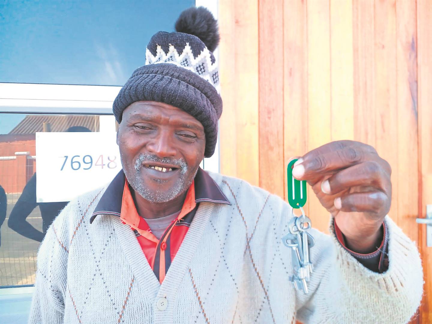 Mkhulu Wilson Jonga, who has been living in a church for years, is happy to finally move into his new house.   Photos by     Lulekwa Mbadamane