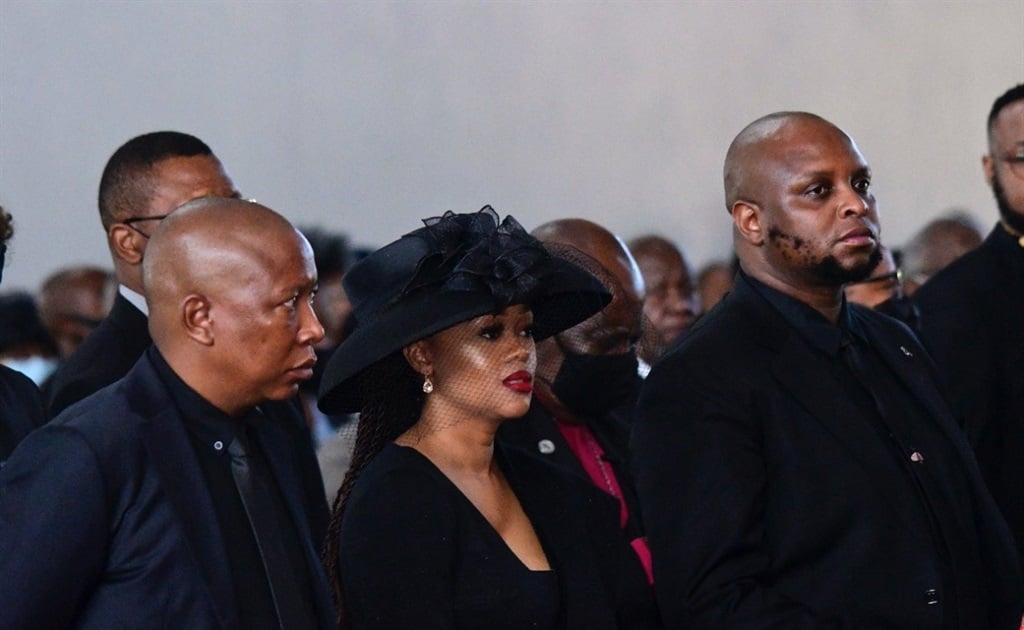 EFF leader Julius Malema, his wife Mantoa Matlala and EFF deputy president Floyd Shivambu at the funeral service of Hillary Gardee. 