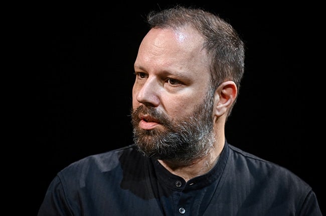 Greek director Yorgos Lanthimos speaks during a press conference after the screening of his new black-and-white short film "Bleat".
