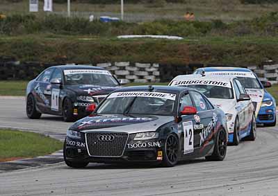 <b>HOT TSCHOPS:</b> Tschops Sipuka and his Audi S4 hold the lead with team mate Michael Stephen running fourth in the second Production Cars race at Aldo Scribante in Port Elizabeth on April 6, 2013. <i>Image: Motorpress</i>