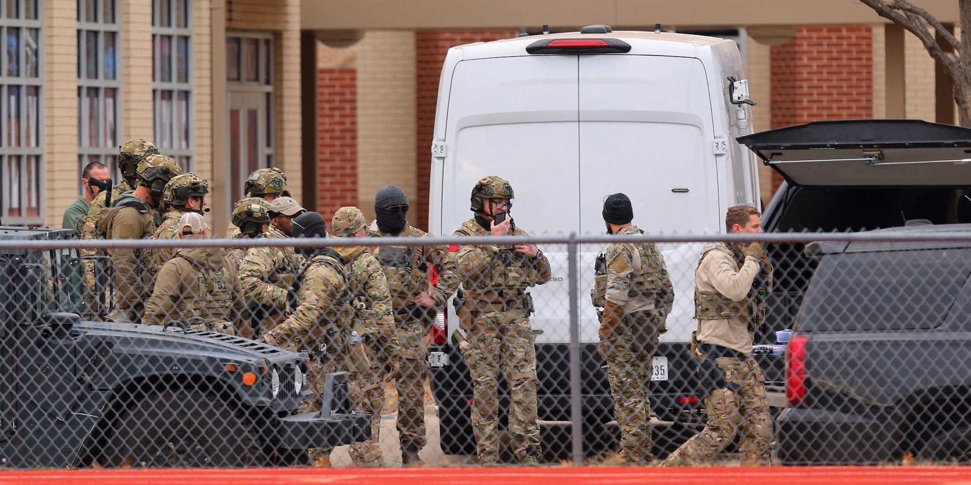 SWAT team members near the Congregation Beth Israel Synagogue in Colleyville, Texas. Andy Jacobsohn/AFP via Getty Images