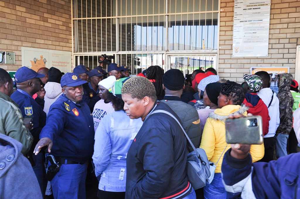 Cops maintained order at the Rustenburg Magistrates Court during the appearance of a suspect accused of killing a pupil. Photos by Rapula Mancai 