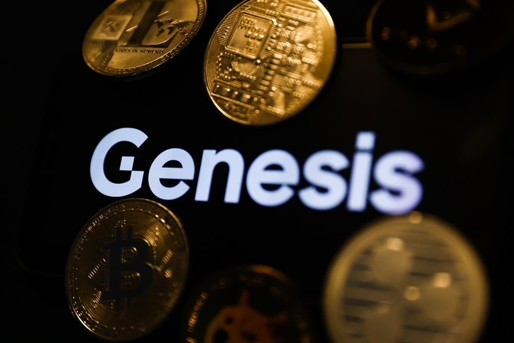 Genesis logo displayed on a phone screen and representation of cryptocurrencies are seen in this illustration photo taken in Krakow, Poland on December 1, 2022. (Photo by Jakub Porzycki/NurPhoto via Getty Images)