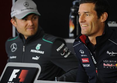  <b> ‘YOUR TEAM MATE ALSO GIVING YOU GRIEF?’</b> Red Bull’s Mark Webber (left) poses with Mercedes driver Nico Rosberg, who is similarly embroiled in an F1 team order saga. <i>Image – AFP</i>