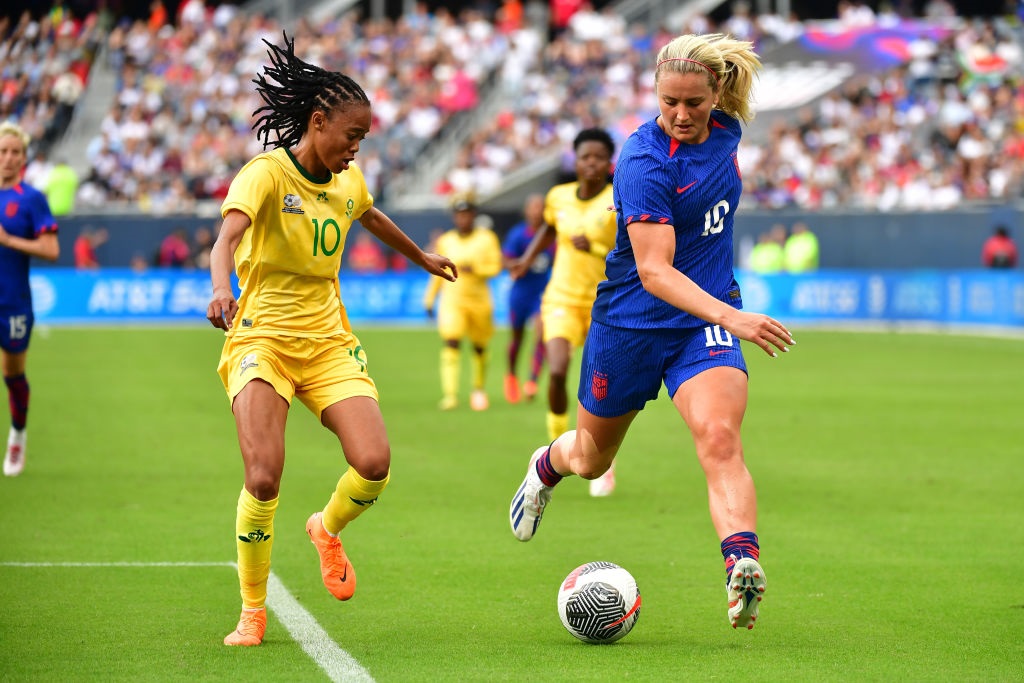 CHICAGO, ILLINOIS - SEPTEMBER 24: Lindsey Horan #10 of the United States is defended by Linda Motlhalo #10 of South Africa during the first half at Soldier Field on September 24, 2023 in Chicago, Illinois. (Photo by Jane Gershovich/ISI Photos/USSF/Getty Images for USSF)