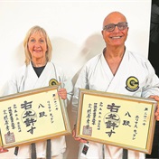 Karate couple reach 8th Dan together in world first