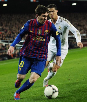 Lionel Messi and Cristiano Ronaldo will compete for the FIFA Ballon d'Or. Picture: Manu Fernandez/AP