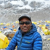 'Everest Man': Nepali mountaineer climbs world's highest mountain for record 27th time