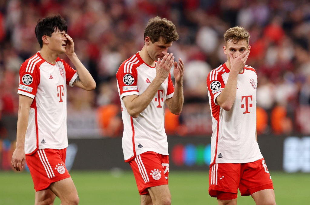 MUNICH, GERMANY - APRIL 30: Kim Min-Jae, Thomas Mueller and Joshua Kimmich of Bayern Munich react at full-time following the teams draw in the UEFA Champions League semi-final first leg match between FC Bayern MÃ¼nchen and Real Madrid at Allianz Arena on April 30, 2024 in Munich, Germany. (Photo by Alexander Hassenstein/Getty Images)