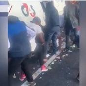 WATCH | Drama on the N7 - Cash van robbed, suspects arrested and passersby loot money
