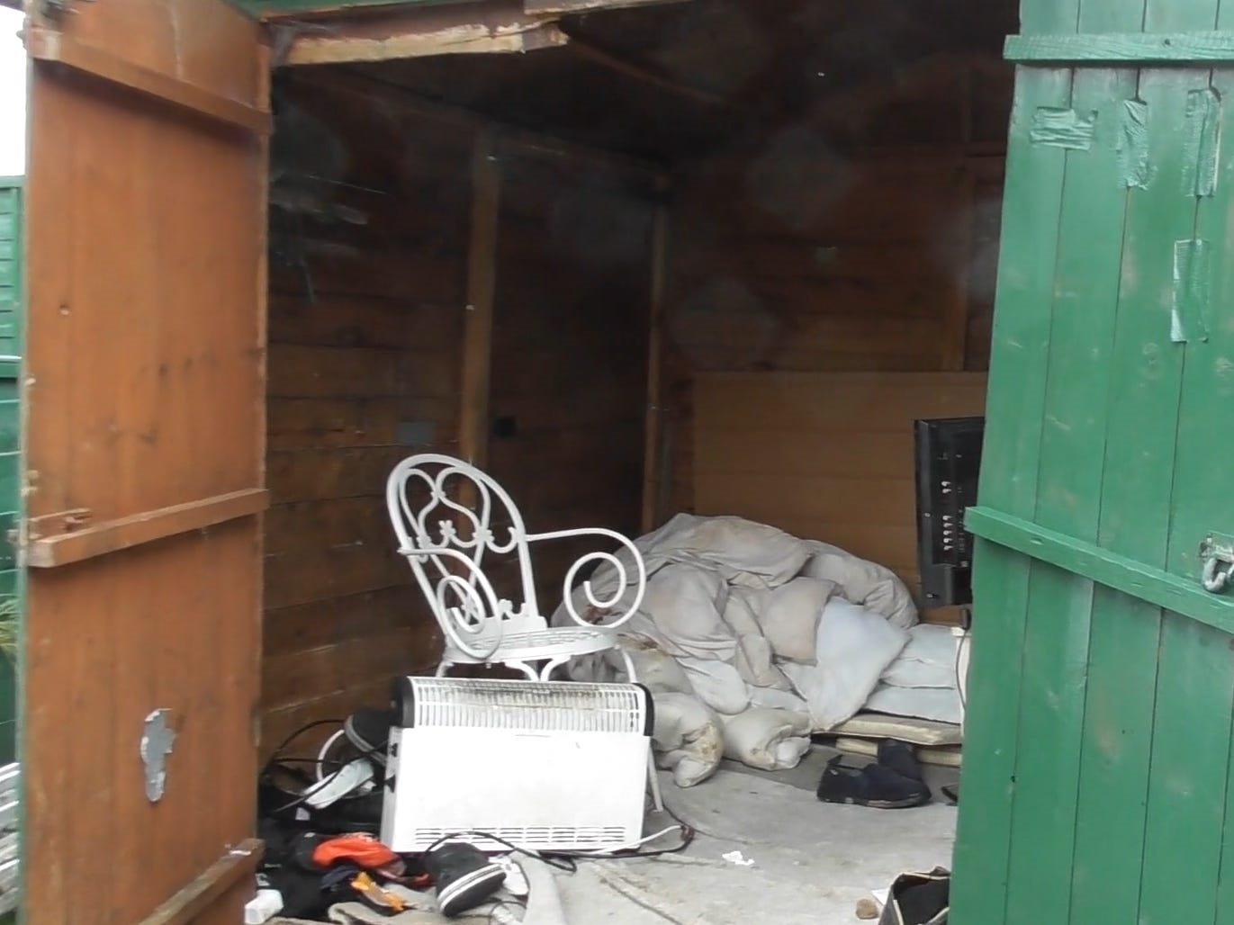 This is the shed that Peter Swailes, 56, kept a worker in for some 40 years. Investigating officers from the UK authorities found a soiled duvet and no working source of light or heating in the shed, noting that the family's dog had far better living quarters. GLAA/Vimeo