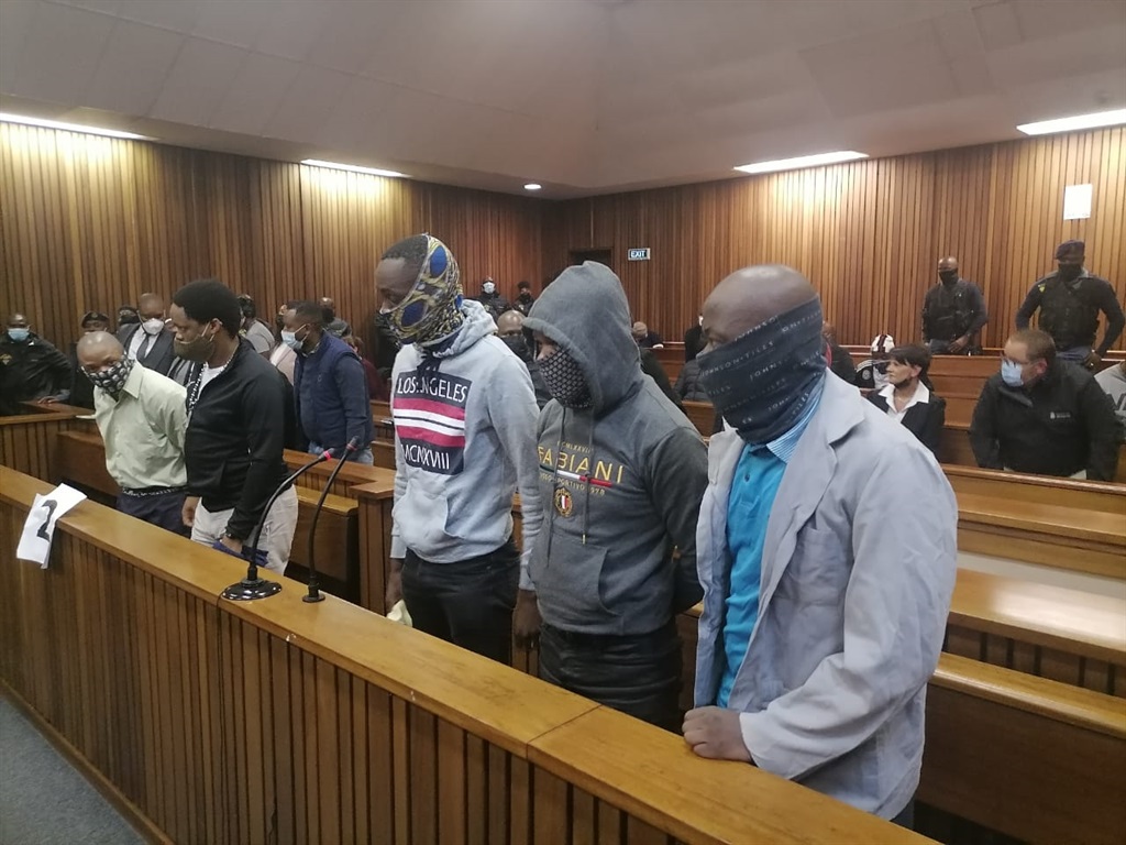 Muzikawukhelwa Sibiya, Bongani Ntanzi, Mthobisi Mncube, Mthokoziseni Maphisa and Sifisokuhle Ntuli appearing at the North Gauteng High Court in Pretoria. Photo by Aaron Dube