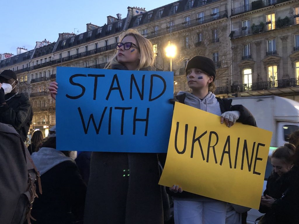 People gather during a demonstration in support of Ukraine, following Russia's military intervention, on February 24, 2022, in Paris, France. 