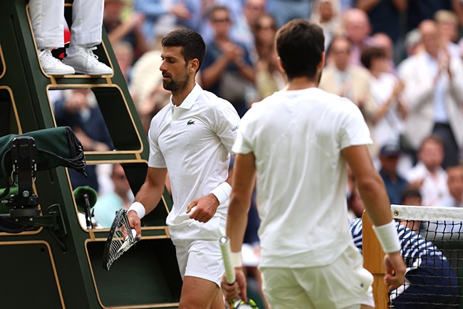 Novak Djokovic after smashing his racquet in the Wimbledon final. (Photo by Clive Brunskill/Getty Images)