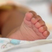Body of newborn baby found in toilet sanitary bin