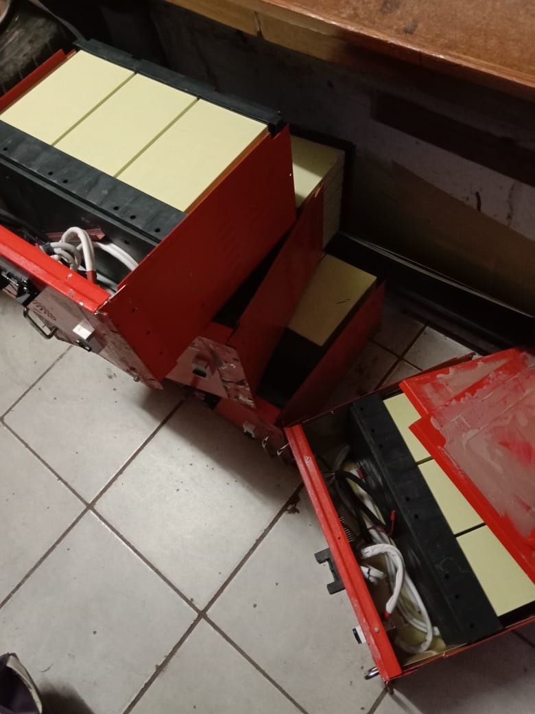 Cellphone tower batteries stacked up after being seized